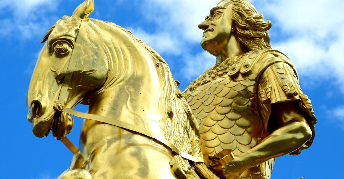 Mega knight crush terminating Ram Rider's charge - Golden Statue Under Blue Skies during Day Time Mega knight crush terminating Ram Rider's charge - Golden Statue Under Blue Skies during Day Time