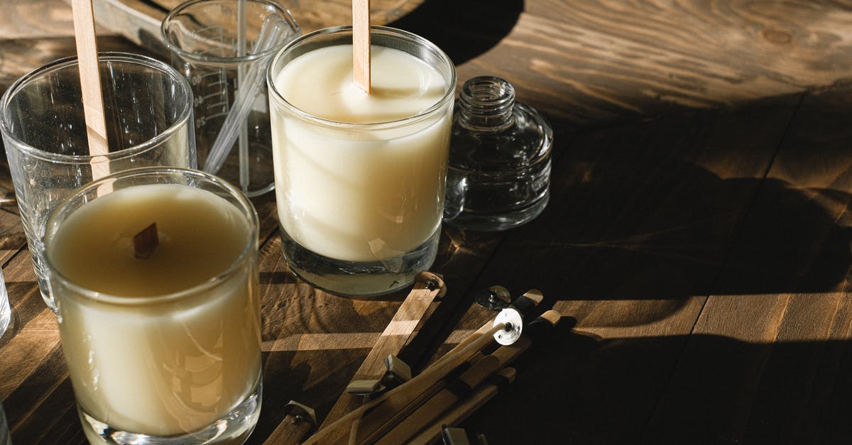 Memoria Freese skill Material Killer - Glasses with organic candles on wooden table Memoria Freese skill Material Killer - Glasses with organic candles on wooden table