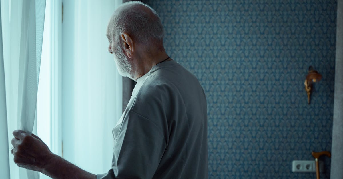 Metro: 2033 Crashes Immediately After Opening - Man in Gray Polo Shirt Standing Near White Window Curtain Metro: 2033 Crashes Immediately After Opening - Man in Gray Polo Shirt Standing Near White Window Curtain