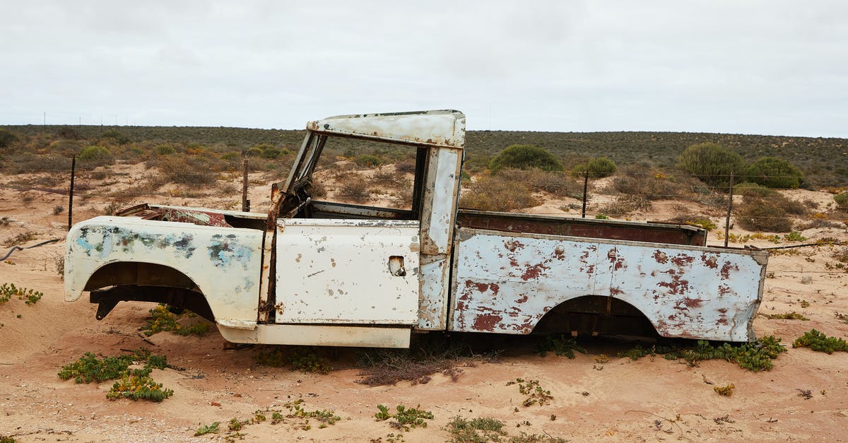 MHW How to enable damage meter in training area? - Rusty abandoned car near fence in desert