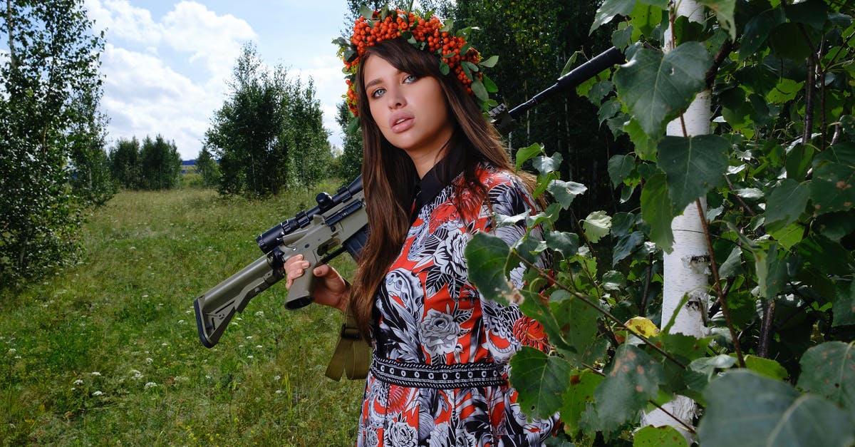 Military uprising and other problems in Tropico 5 - Young woman with assault rifle in countryside