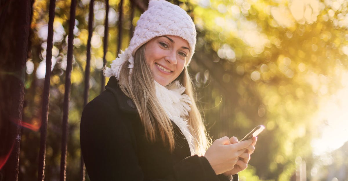 Minecraft 1.10 Not Switching To Forge - Smiling woman chatting on smartphone in park Minecraft 1.10 Not Switching To Forge - Smiling woman chatting on smartphone in park