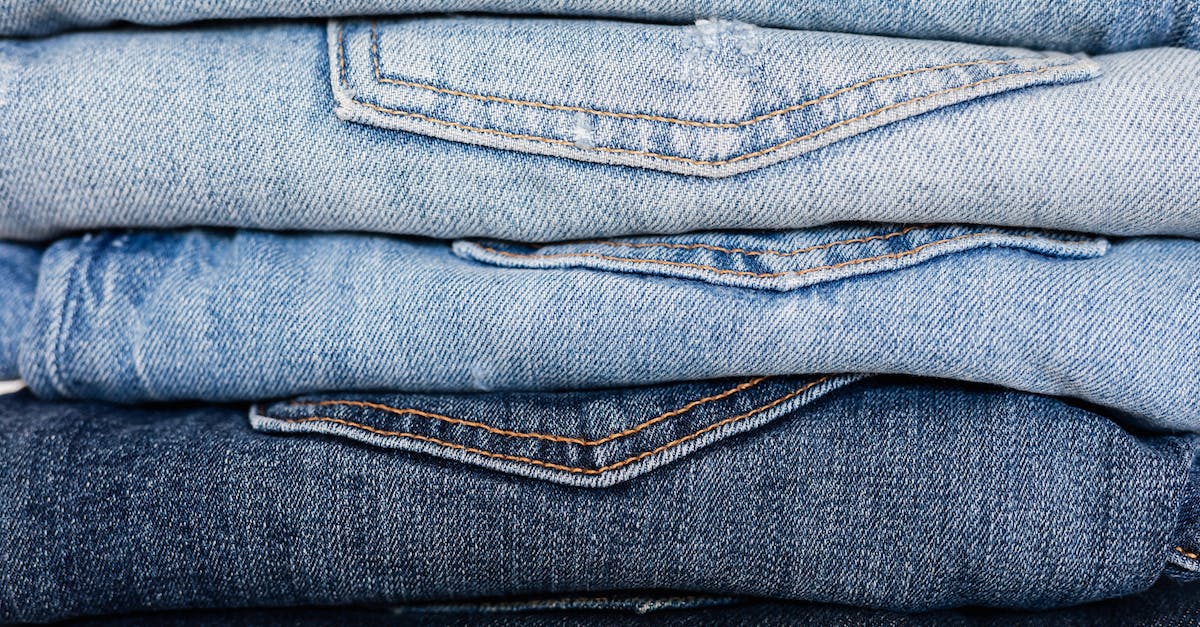 Minecraft alpha 1.2.6 lags when loading new chunks. Anyway to tone down the lag? - Closeup of stack of blue denim pants neatly arranged according to color from lightest to darkest