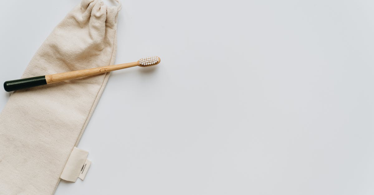 Minecraft alpha 1.2.6 lags when loading new chunks. Anyway to tone down the lag? - Top view of beige fabric crumpled bag with ties and clean wooden toothbrush on white background with smooth surface