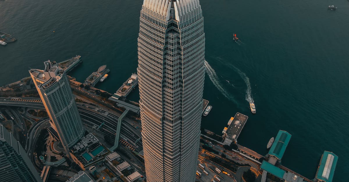 Minecraft: building a tower of arbitrary height from inside - Geometric skyscraper located in city downtown at seafront Minecraft: building a tower of arbitrary height from inside - Geometric skyscraper located in city downtown at seafront
