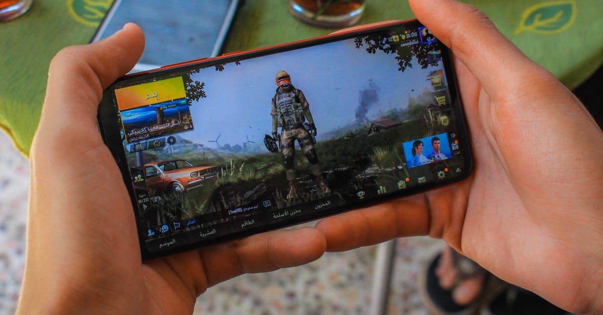 Minecraft: Display Player gamemode (in game) using commands? - Crop faceless man playing video game on smartphone