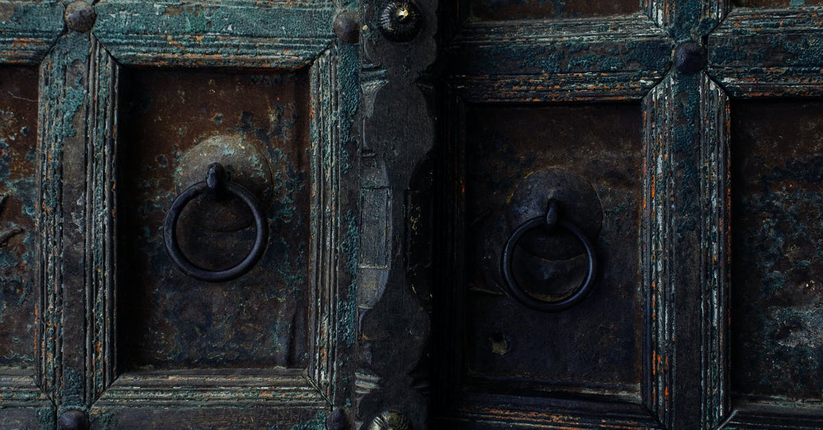 Minecraft Forge textures missing as of update 1.7.10 - Weathered metal gates with metal handles and rusty iron door of aged building