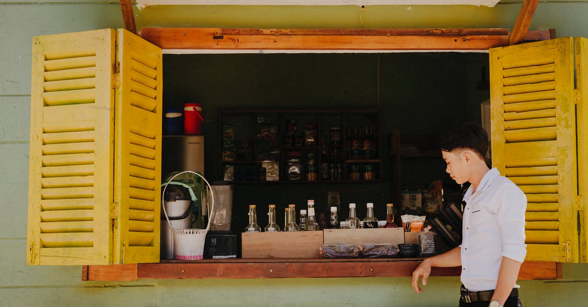 Minecraft Pocket Edition Local Multiplayer - Stylish Asian man near local shop with beverages for sale Minecraft Pocket Edition Local Multiplayer - Stylish Asian man near local shop with beverages for sale