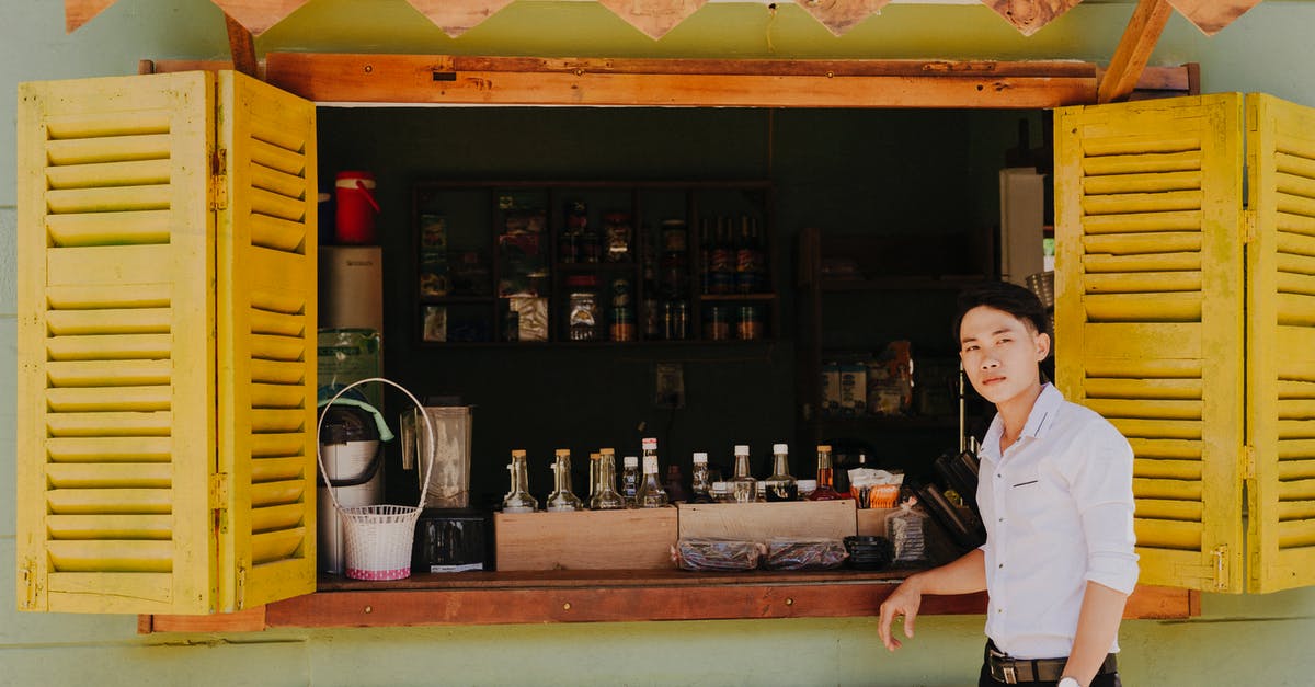 Minecraft Pocket Edition Local Multiplayer - Trendy Asian man near local shop with assorted beverages Minecraft Pocket Edition Local Multiplayer - Trendy Asian man near local shop with assorted beverages