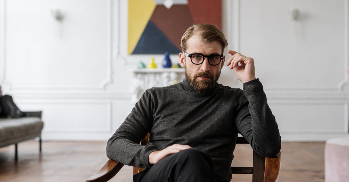 Minecraft problem with commands - /testfor health - Man in Black Sweater Sitting on Brown Wooden Chair