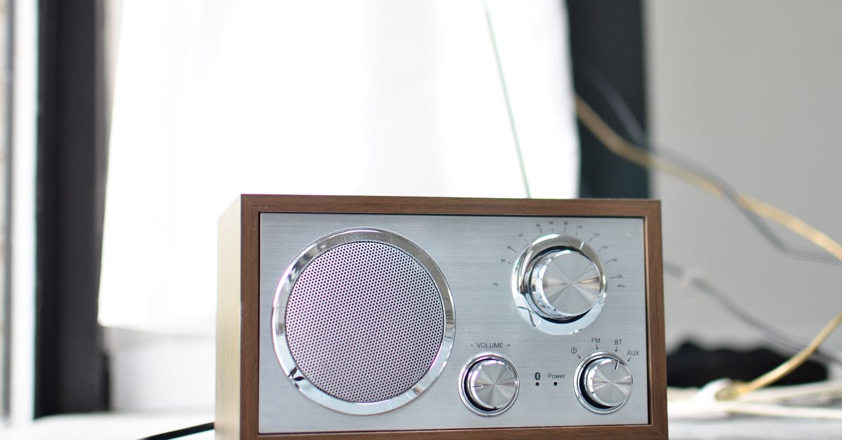 Minecraft, reverse default of rail switch w/ button - Classic styled radio receiver with chrome buttons and speaker and wooden case placed on table in daylight