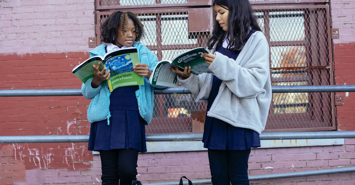 Minecraft SelectedItem: help with block data tags? [duplicate] - Serious multiracial girls doing homework with textbooks near school