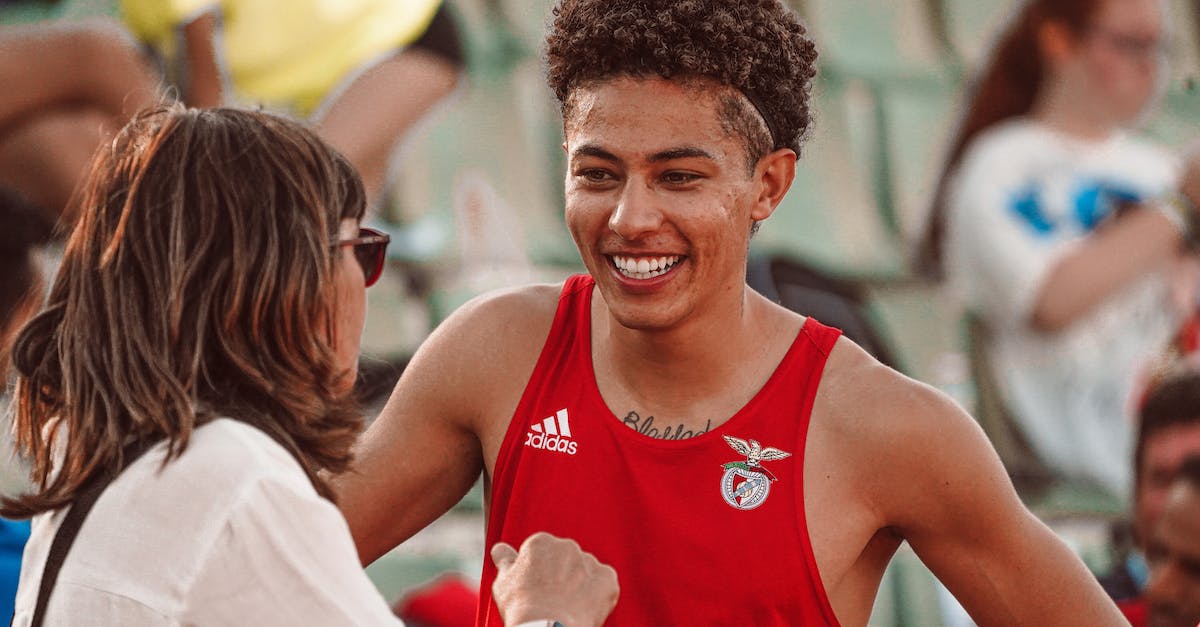 Minecraft server is overloaded by one specific player - Man in Red Tank Top Smiling