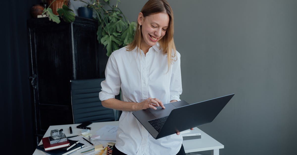 Minecraft Server makes PC lose internet - Woman in White Dress Shirt Using Macbook