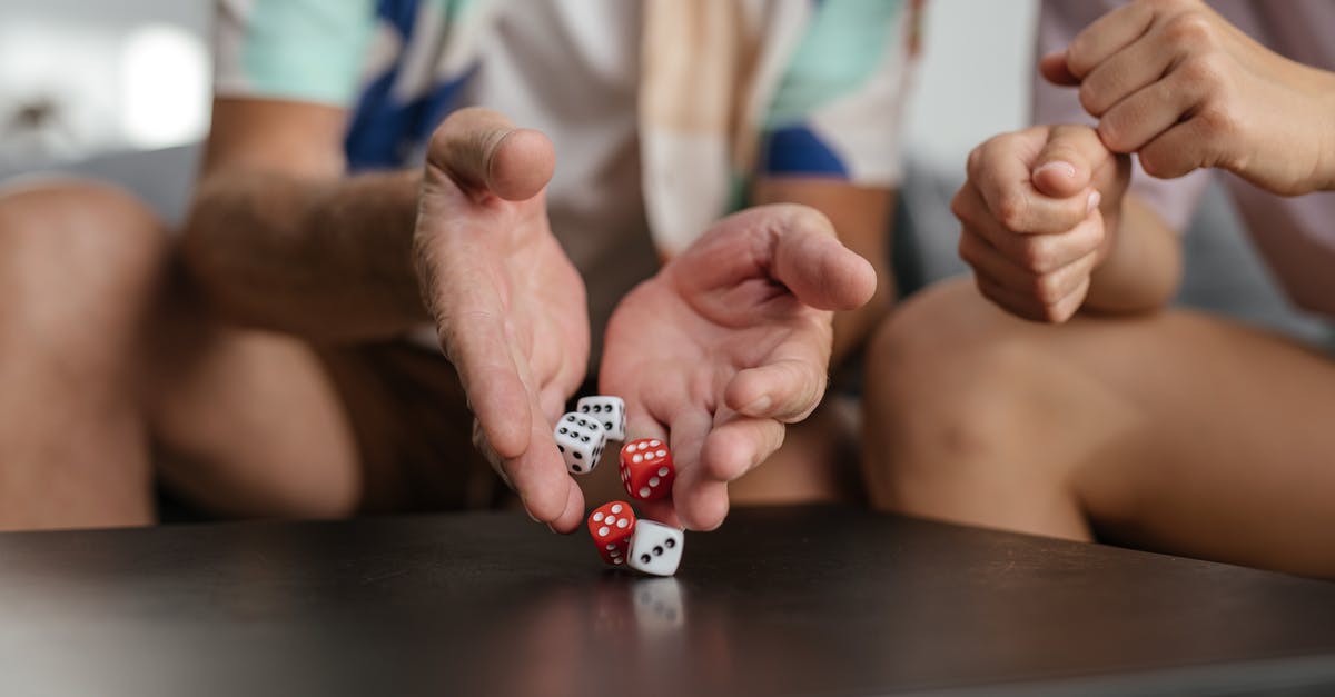 Minecraft: /setblock a playing jukebox - Person Holding Red and White Dice