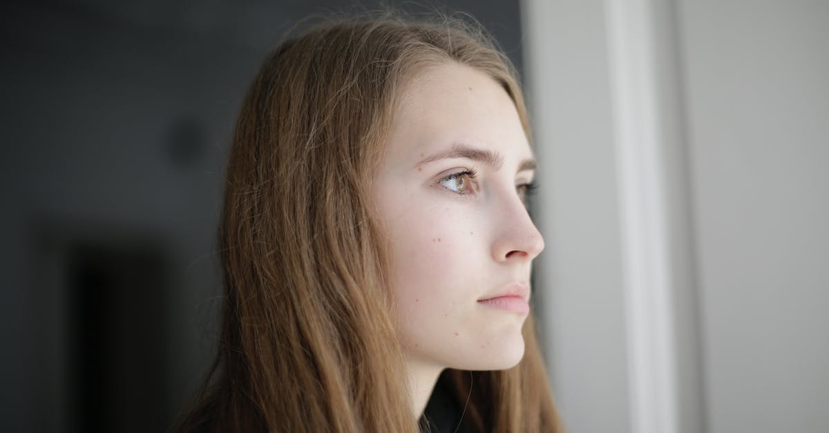 minecraft skin uploading problem - Pensive young woman in living room