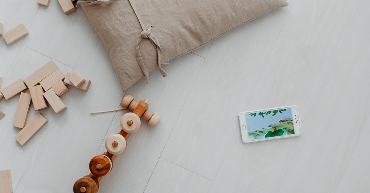 Minecraft Summing Blocks/Skulls - Brown Wooden Rolling Pin on White Wooden Table