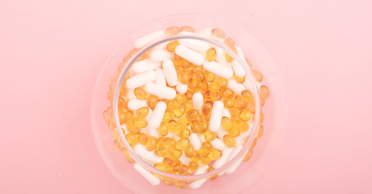 Minecraft too many logins / blacklisted IP help? - Top view of glass bowl filled with many capsules and pills for curing disease on pink background