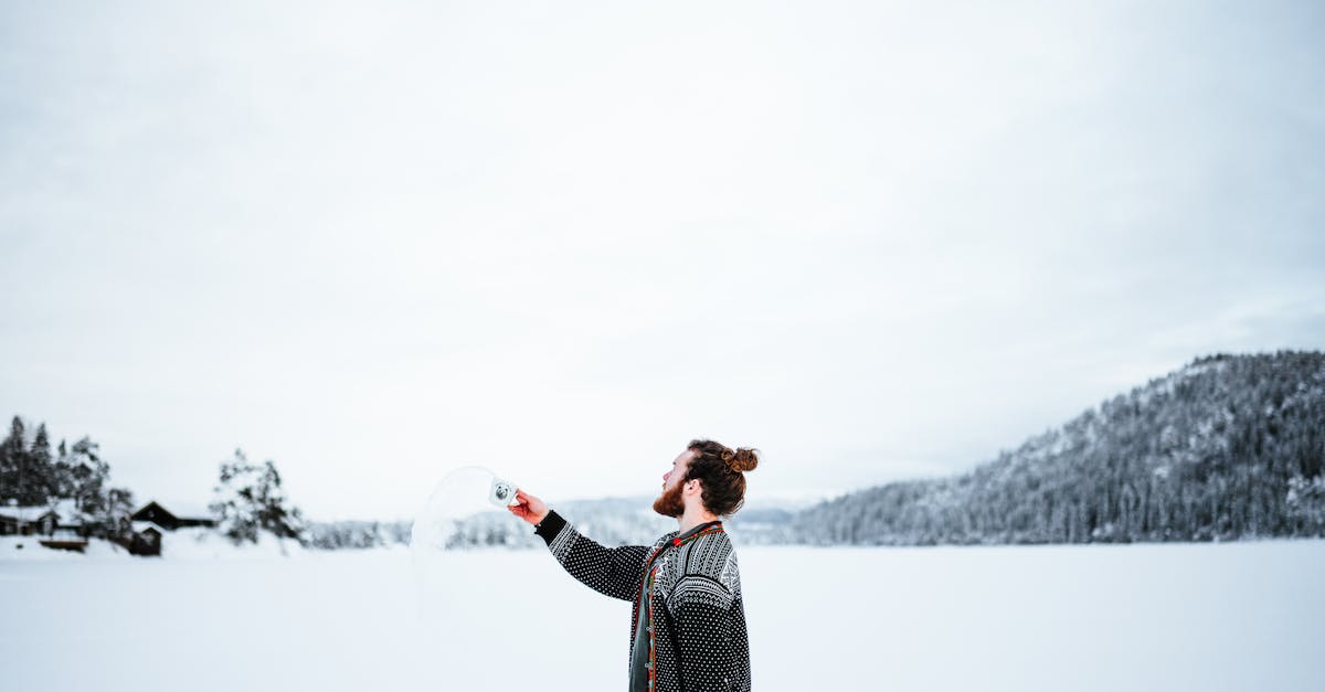 Minecraft water freezing level - Man Standing Outside in Winter and Throwing Water From a Cup Minecraft water freezing level - Man Standing Outside in Winter and Throwing Water From a Cup