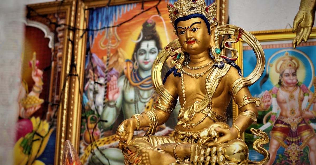 Missed some levers in Temple of the Winds? - Gold Hindu Deity Statue on Brown Wooden Table Missed some levers in Temple of the Winds? - Gold Hindu Deity Statue on Brown Wooden Table