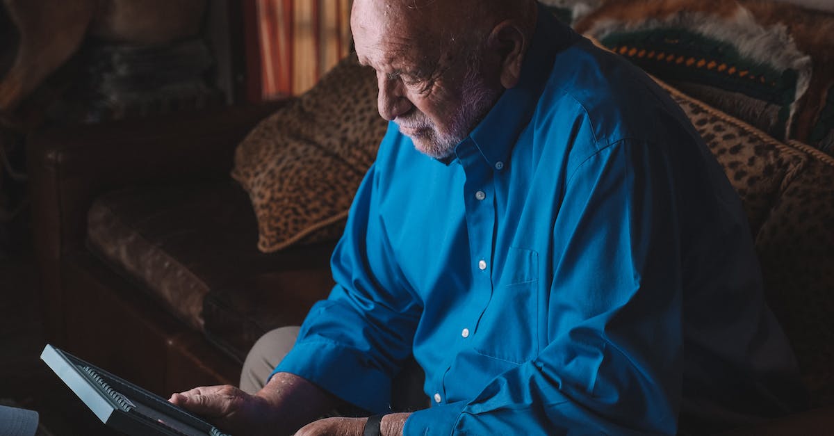 Missing Persons Investigations last mission won't trigger - Man Sitting on a Sofa Holding a Photo Frame