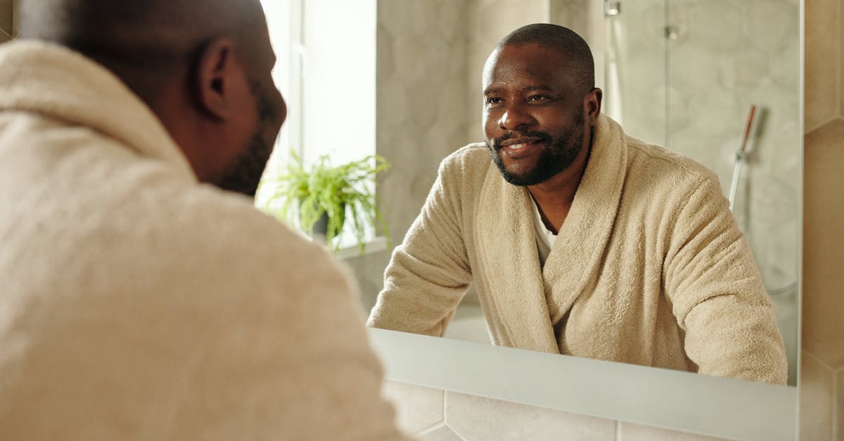 Missing reflection - A Man Looking at a Mirror 