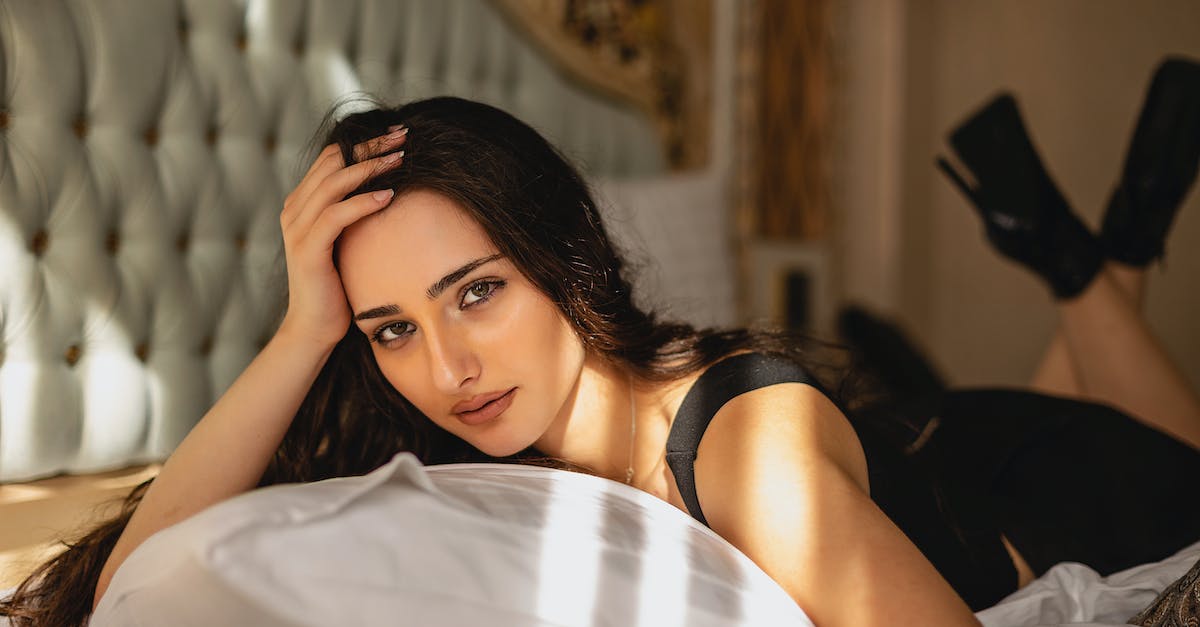 Modding Morrowind - Woman in Black Tank Top Lying on Bed Modding Morrowind - Woman in Black Tank Top Lying on Bed