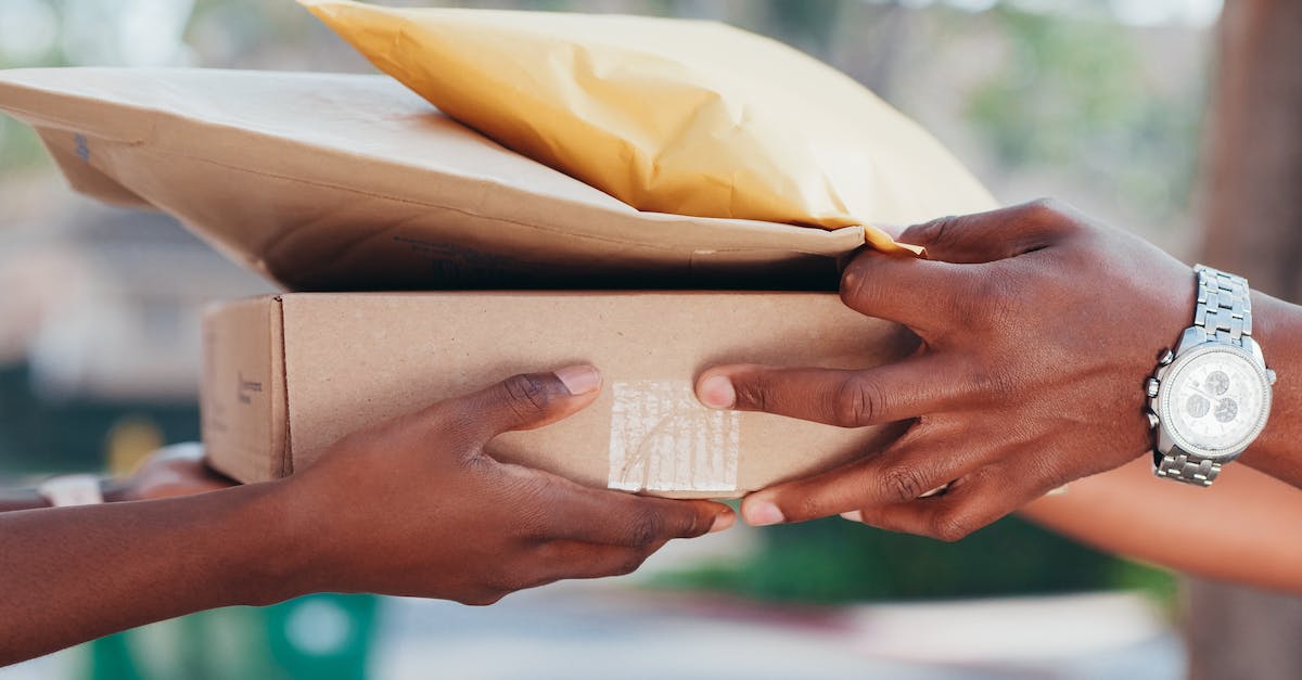 More than one delivery location - Person Holding Brown Paper on Brown Textile