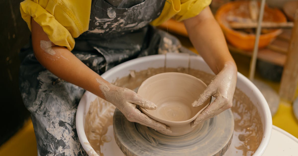 Most effective method of making money? - Person in Yellow Shirt Making Clay Pot Most effective method of making money? - Person in Yellow Shirt Making Clay Pot