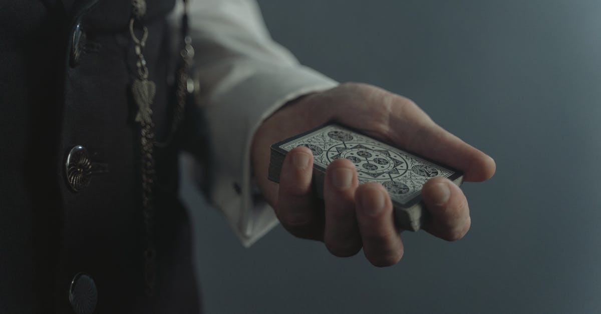 Most efficient way to unlock all cards for decks - Person Holding Cards