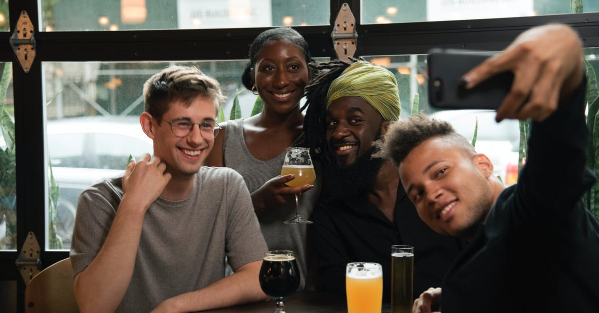 Mount and Blade Warband - How to capture a friendly town? - Happy multiethnic friends taking selfie on smartphone in cafe Mount and Blade Warband - How to capture a friendly town? - Happy multiethnic friends taking selfie on smartphone in cafe