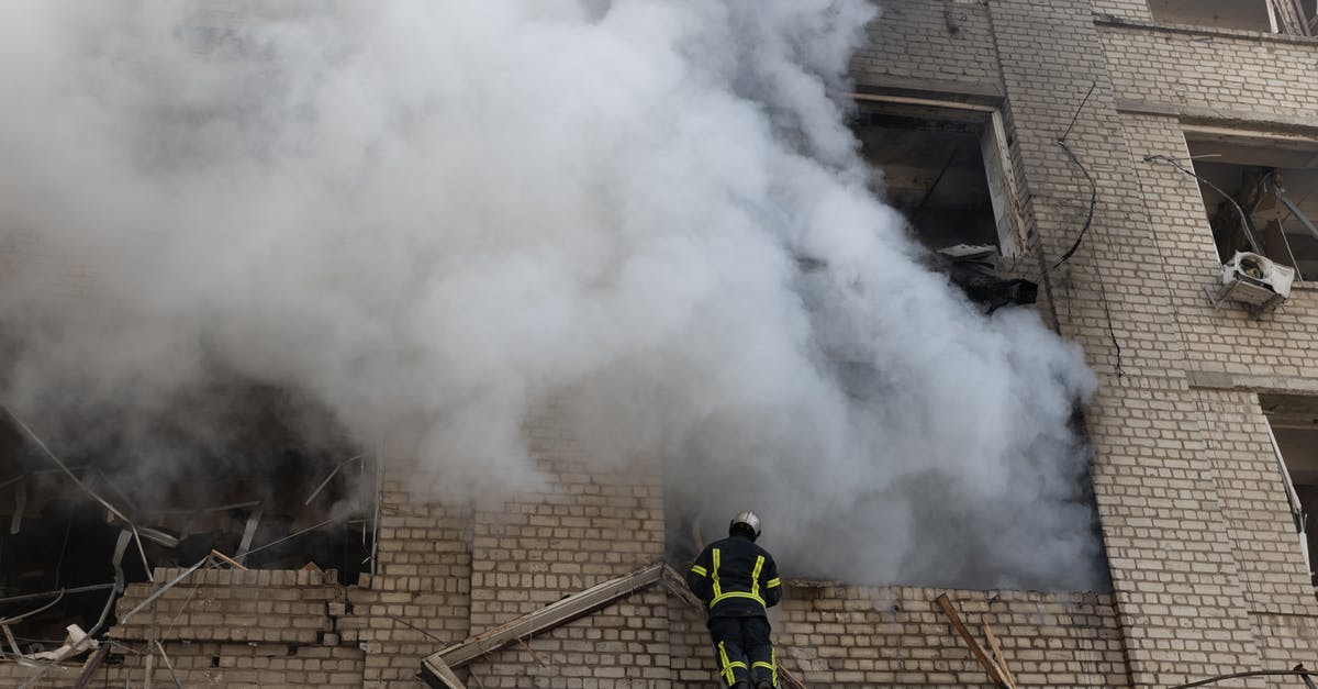 Mounting a time-limited rescue mission for kerbal inbound to Kerbin - Man in Green Jacket and Black Pants Standing on Brown Wooden Ladder