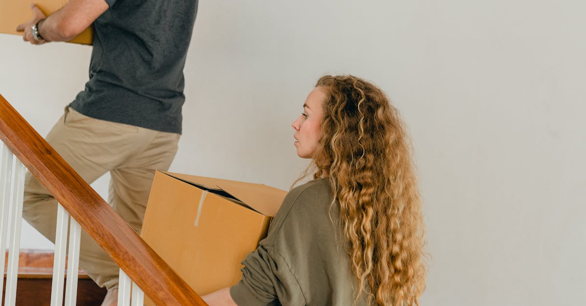 Move one PS4 hard disk to another - Young couple moving boxes into new apartment Move one PS4 hard disk to another - Young couple moving boxes into new apartment