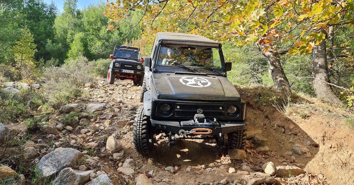 Moving to an adventure without entering - Two Cars Moving on a Dirt Road