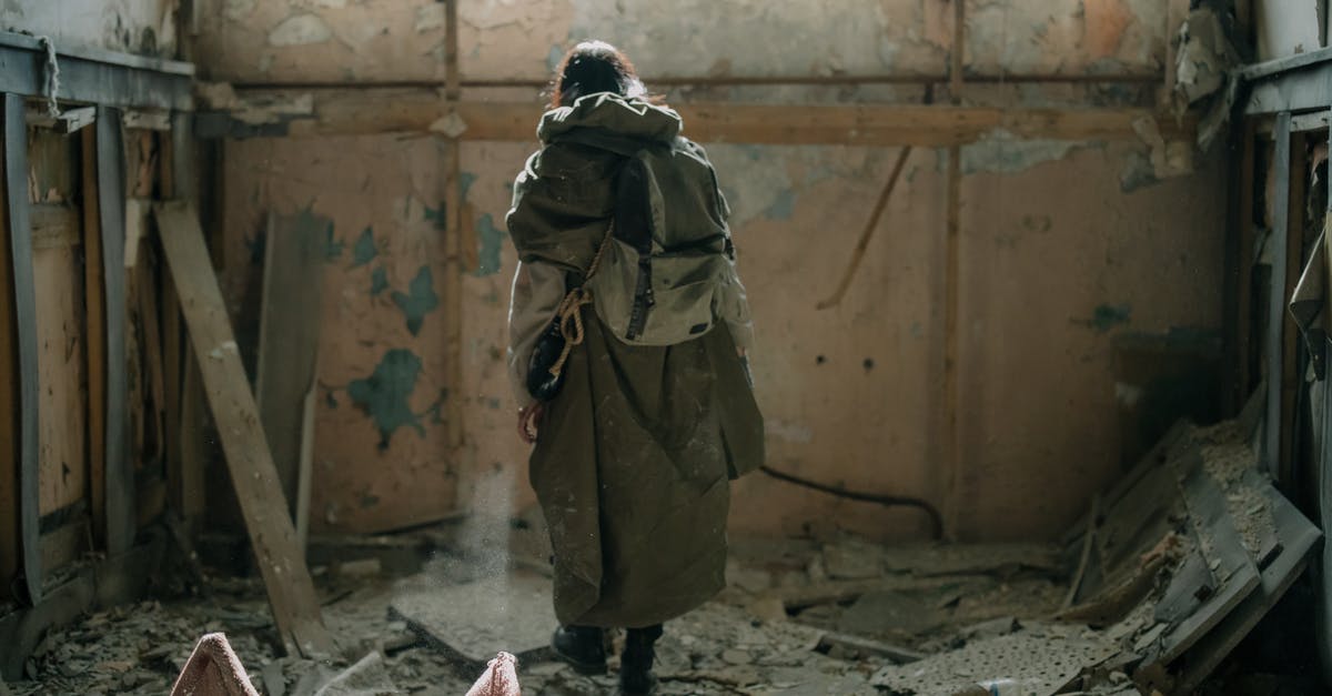 Multiplayer survival on PS4? - Person in Brown Coat and Black Pants Standing on Gray Concrete Floor Multiplayer survival on PS4? - Person in Brown Coat and Black Pants Standing on Gray Concrete Floor