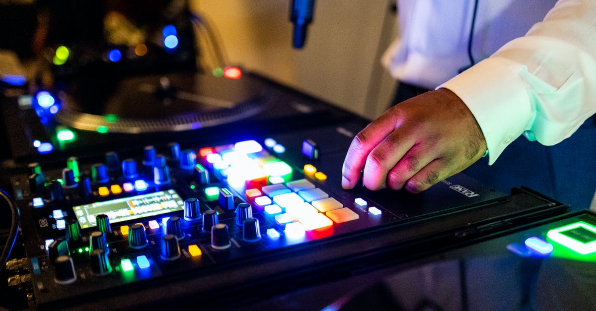 Multiple buttons having the same internal ID - Person Playing Black and Green Audio Mixer