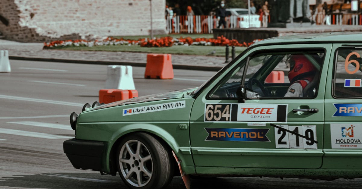 My car almost always gets into a drift while making turns - Old car racing in city downtown