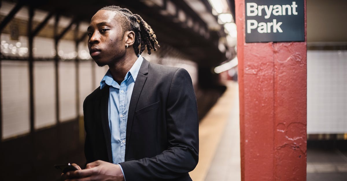 My citizens are too smart - Serious young male waiting for train in New York underground