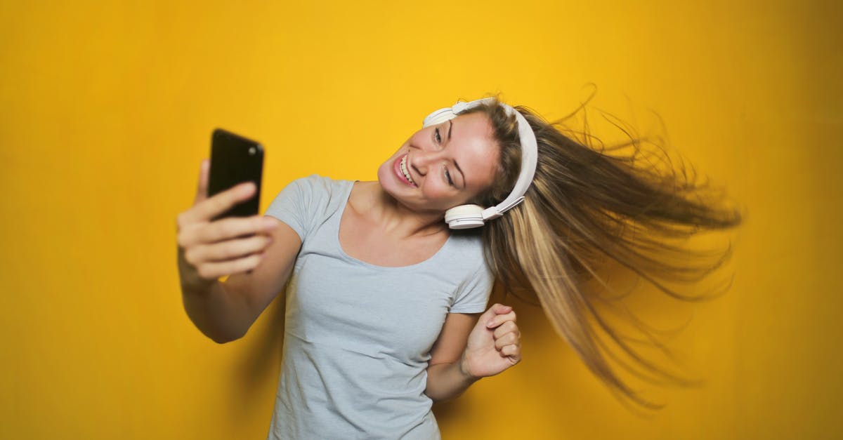 My dwellers aren't happy - Photography of a Woman Listening to Music
