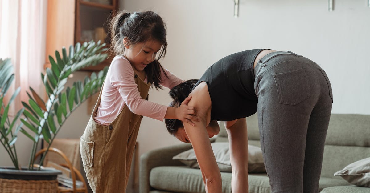 My follower's body turns grey - Young flexible ethnic woman with cute daughter during workout together My follower's body turns grey - Young flexible ethnic woman with cute daughter during workout together