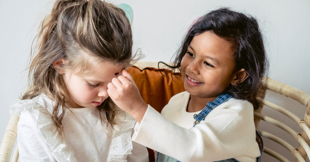 My friend and I wish to play "Minecraft" together, I have xbox gold, he does not. How can we play together?(Without him getting Gold) - Hispanic girl playing with friend on sofa My friend and I wish to play "Minecraft" together, I have xbox gold, he does not. How can we play together?(Without him getting Gold) - Hispanic girl playing with friend on sofa