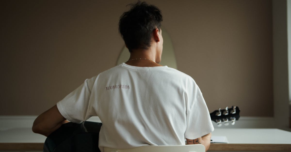 My Nether Portal keeps spawning a new one when i go back from the Nether [duplicate] - Man in White Crew Neck T-shirt