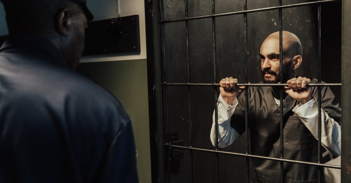 My prisoners wont move from the holding to cell to the actual cell - Bald Man with Beard in Jail