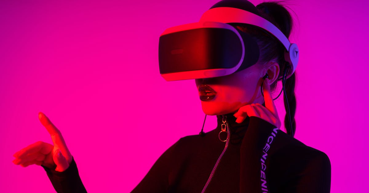 My program works in simulation but fails in game mode - Young female entertaining with virtual reality goggles while playing videogame on pink background in neon light My program works in simulation but fails in game mode - Young female entertaining with virtual reality goggles while playing videogame on pink background in neon light