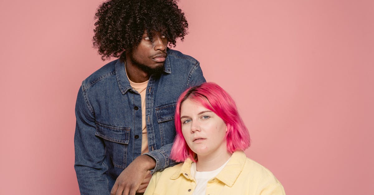 My Resolution won't change, despite being different in the Launcher - Young black man leaning on shoulder of woman with dyed hair sitting against pink background My Resolution won't change, despite being different in the Launcher - Young black man leaning on shoulder of woman with dyed hair sitting against pink background