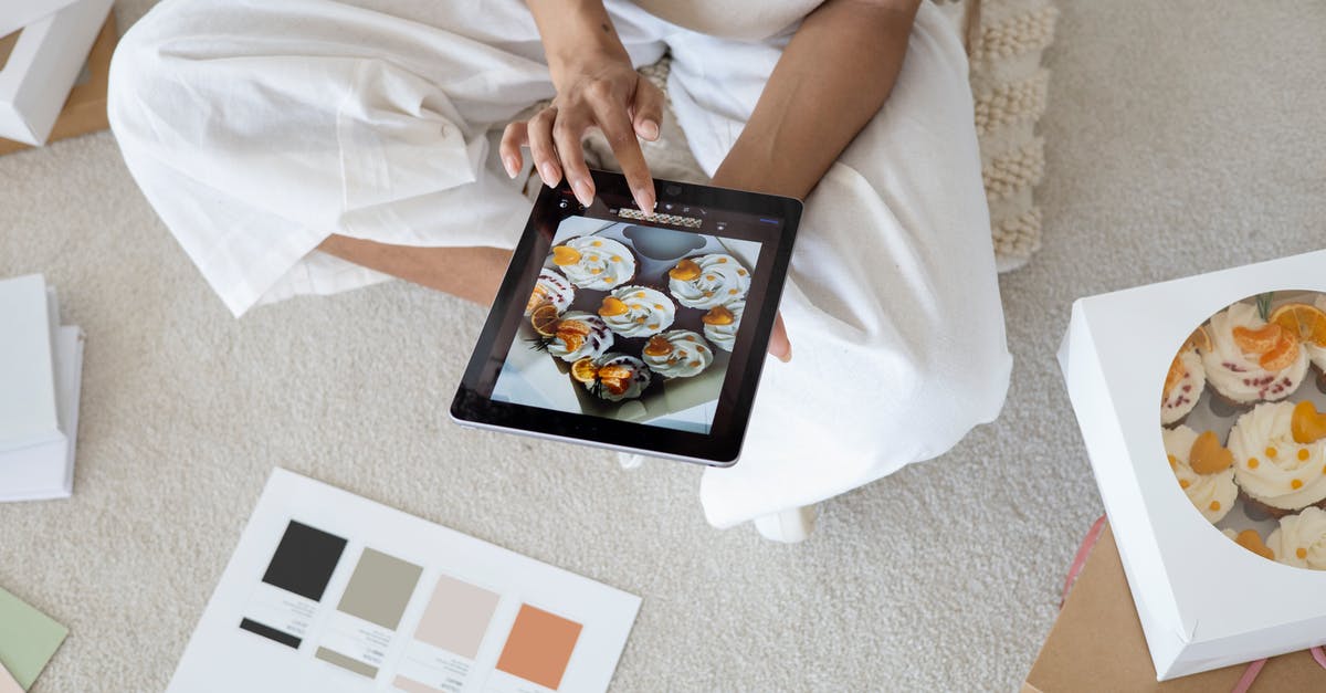 My screen goes partially black after closing a menu item in Team Fortress 2? - Person Holding Black Ipad with Image on Screen My screen goes partially black after closing a menu item in Team Fortress 2? - Person Holding Black Ipad with Image on Screen