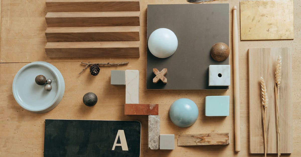 My trainstation doesn't collect the goods from the wood mill but it delivers the wood to it from my train. What is wrong? - White and Blue Ball on Brown Wooden Drawer