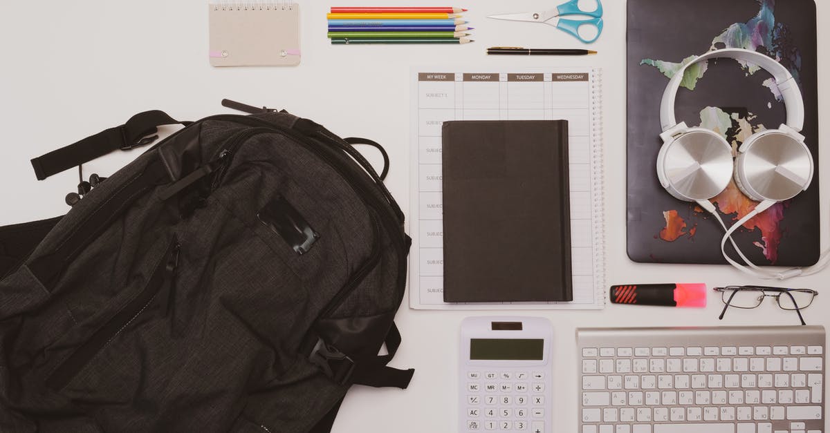 Need to rebind keyboard on EarthSiege 2 - Black Laptop Computer Beside Black Backpack and White Keyboard