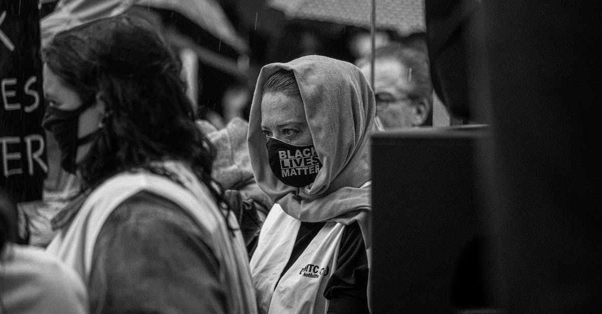 New campaign start - Anonymous protesters in masks with Black Lives Matter inscription