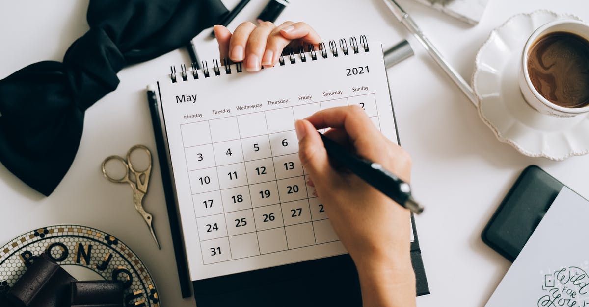 New ranked banked days LOL season 2021 - A Person Writing on a Desk Calendar New ranked banked days LOL season 2021 - A Person Writing on a Desk Calendar